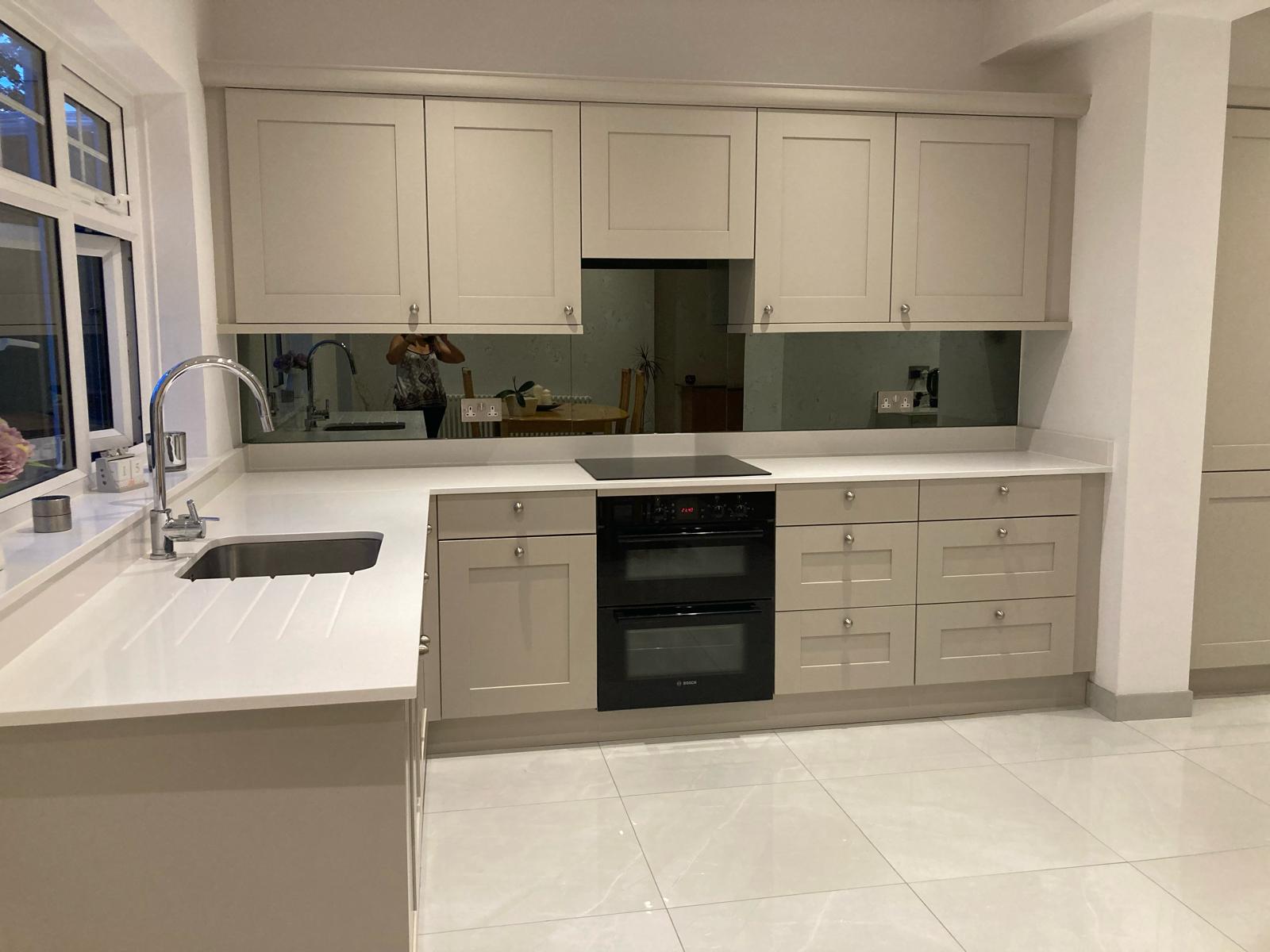 Resprayed in light colour kitchen