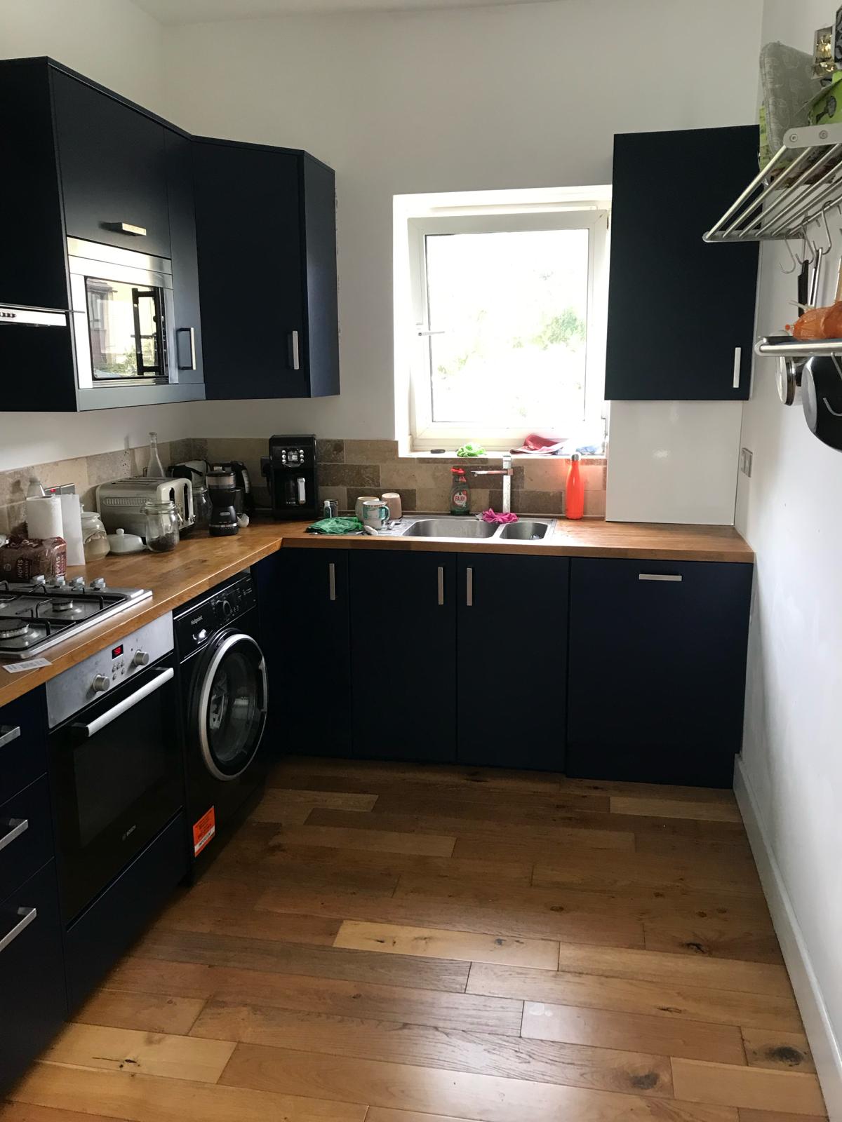 Resprayed in dark colour kitchen