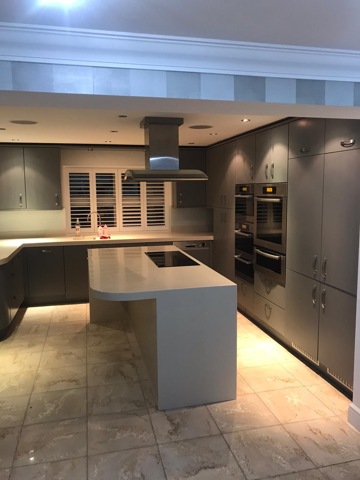 Resprayed dark grey kitchen